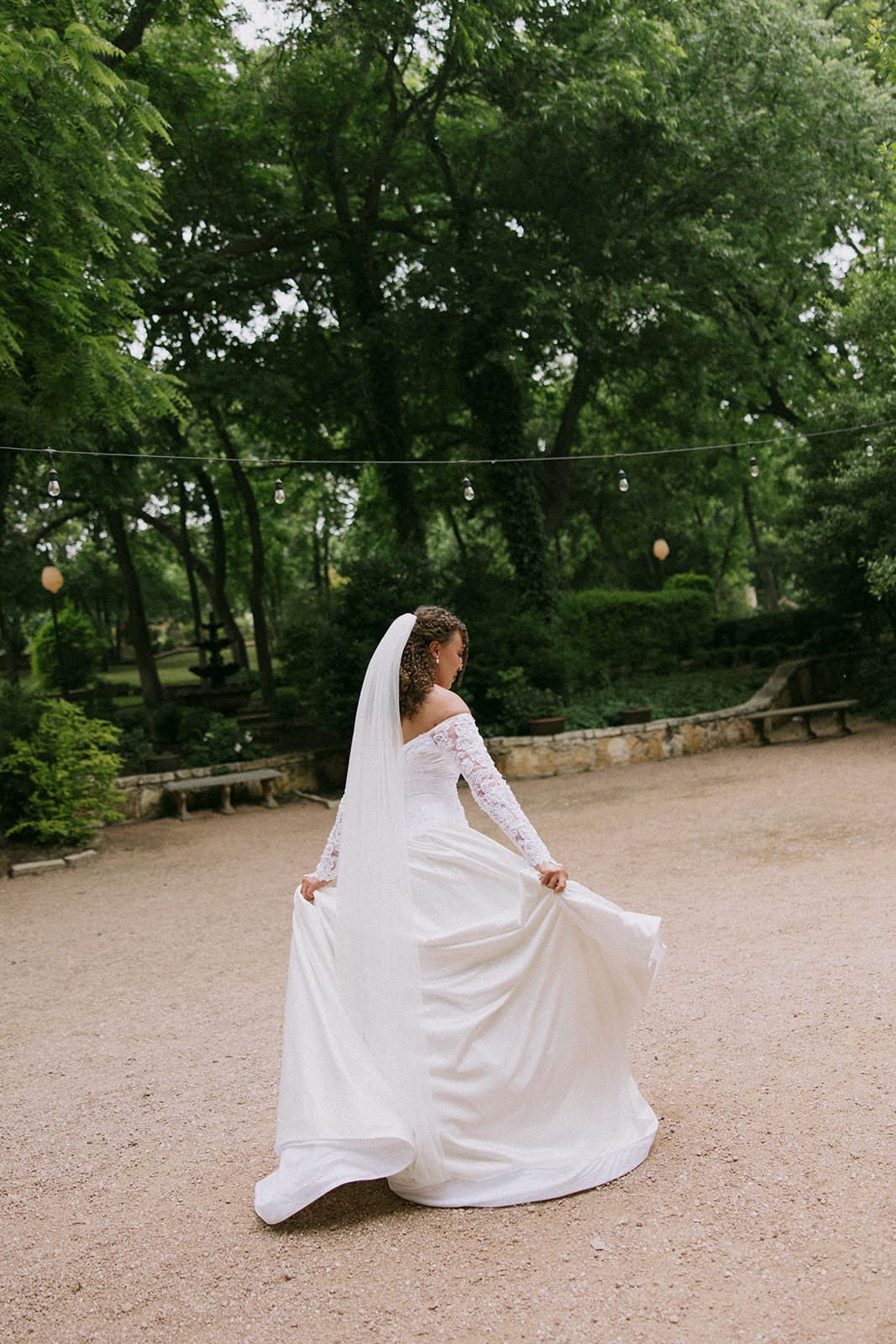 a bride outdoors taking bridal portraits