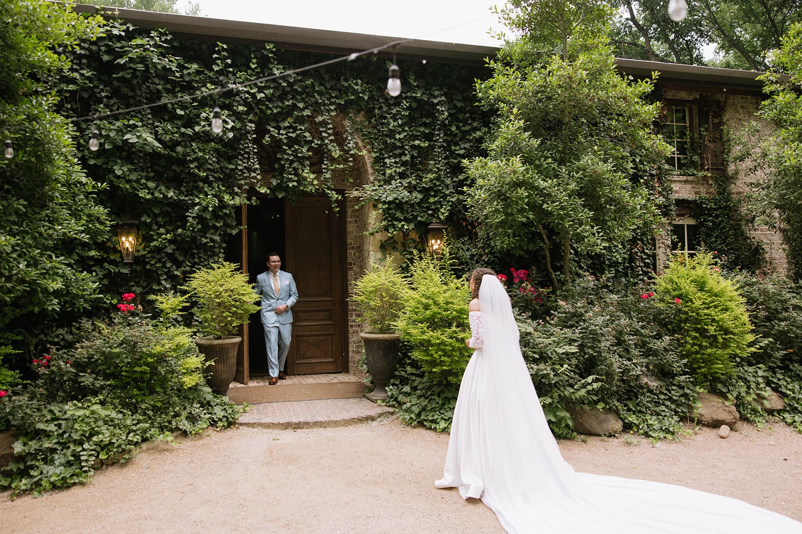 Bride and groom having a first look on their wedding day at The Springs Waxahachie