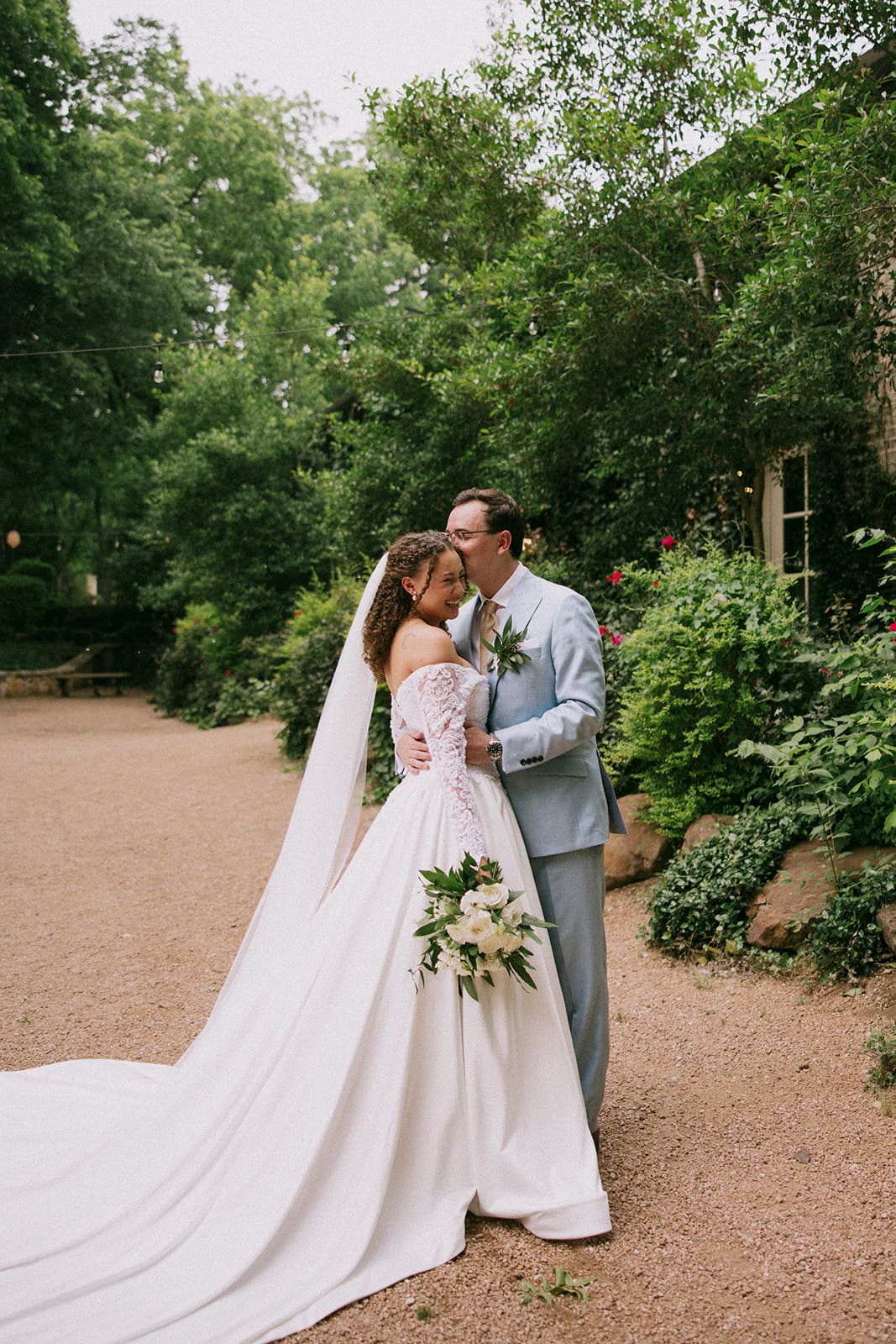 a bride and groom take wedding portraits at The Springs Waxahachie