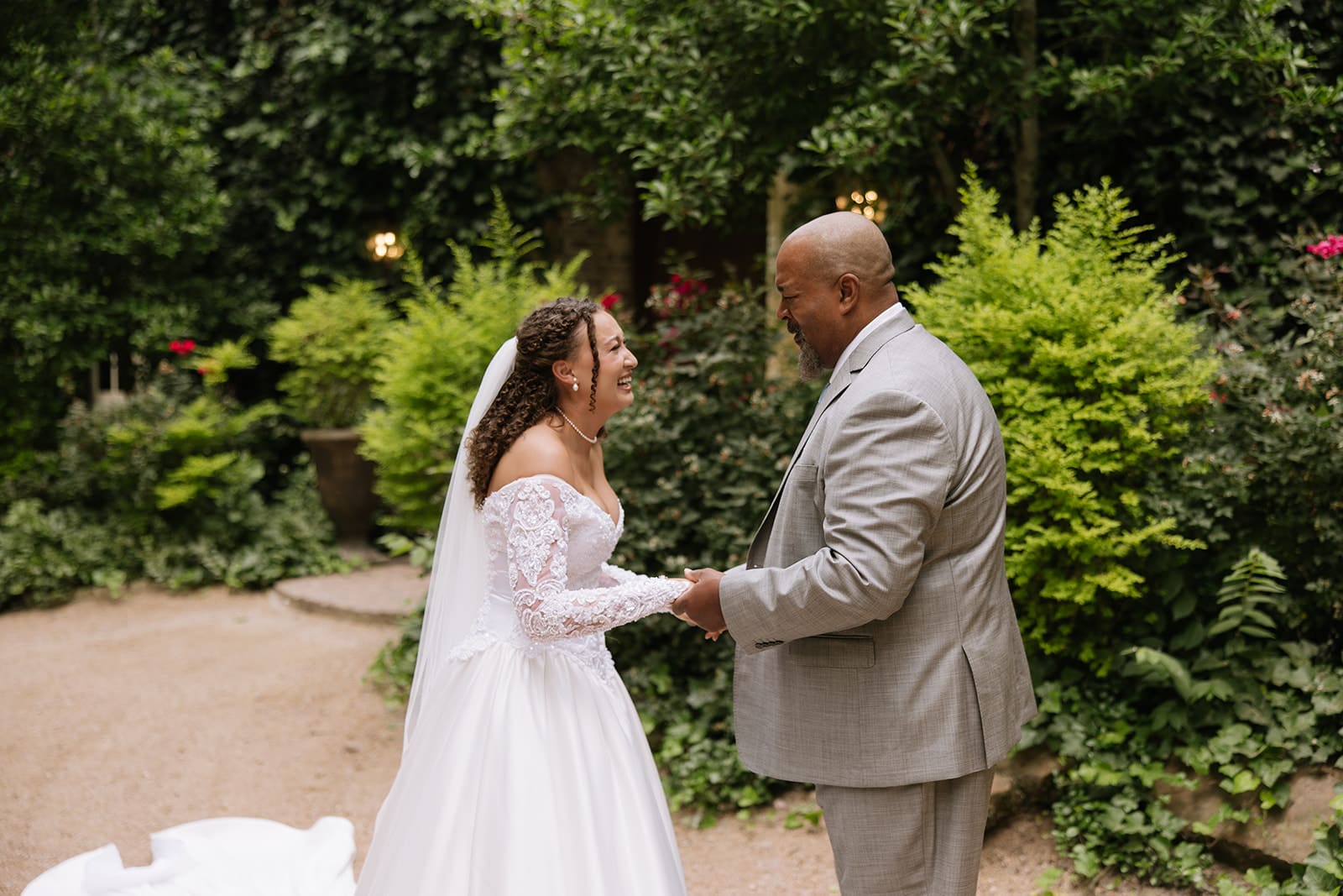Bride having a first look with her dad at The Springs Waxahachie