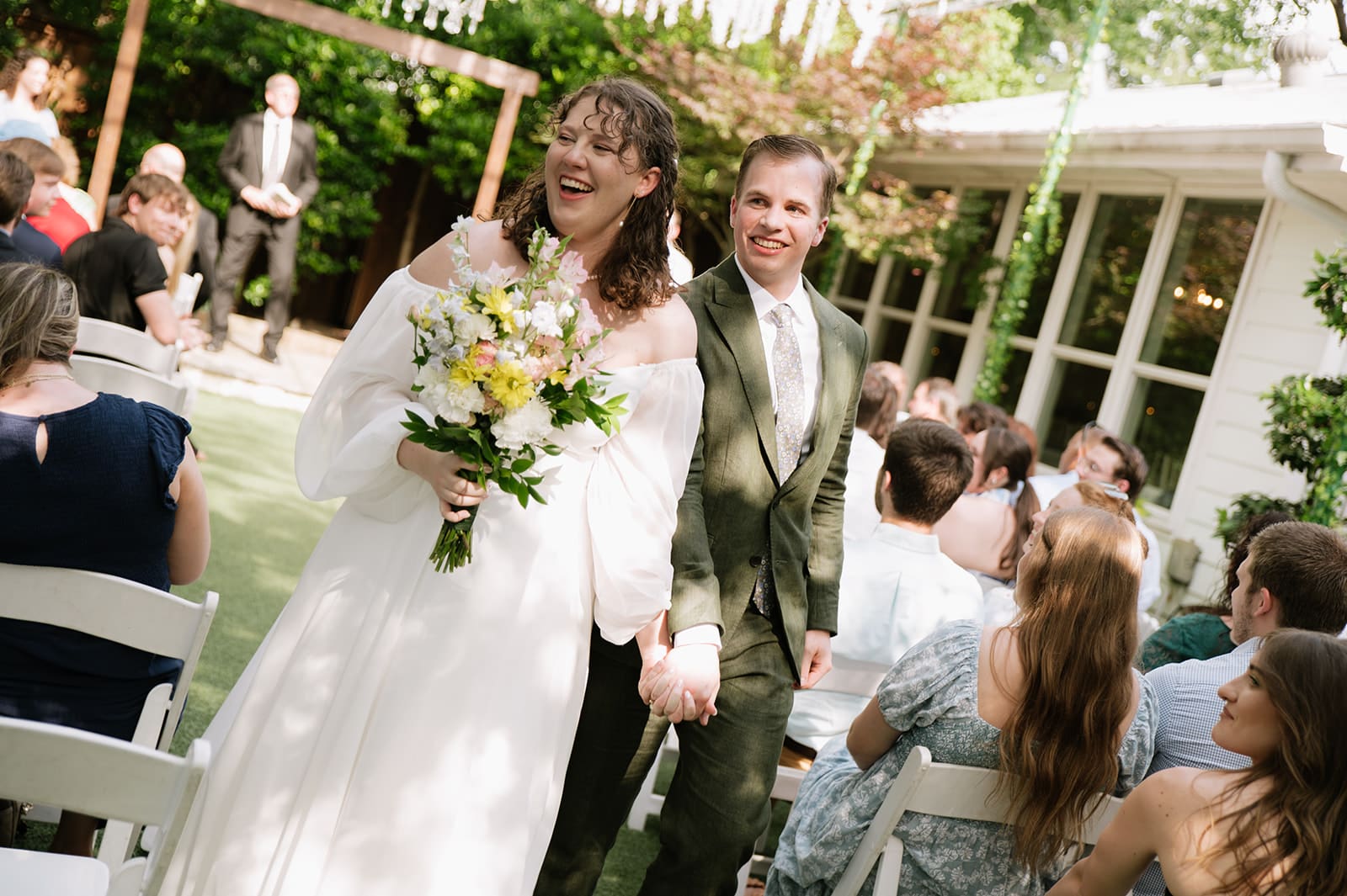 an outdoor wedding ceremony at Magnolia Terrace in Frisco, Tx
