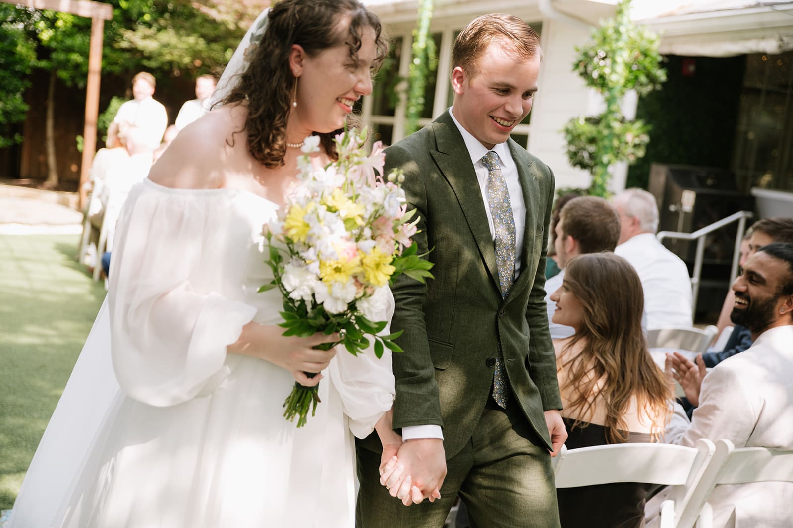 an outdoor wedding ceremony at Magnolia Terrace in Frisco, Tx