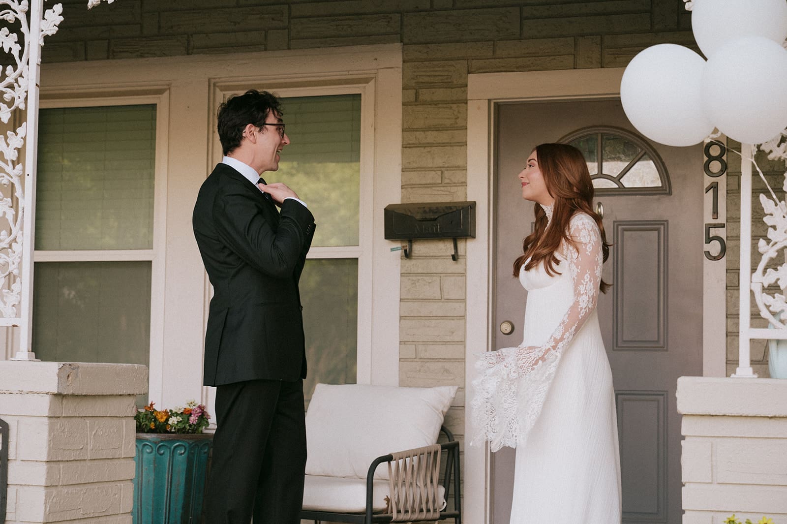 bride and groom do a first look at their intimate backyard wedding