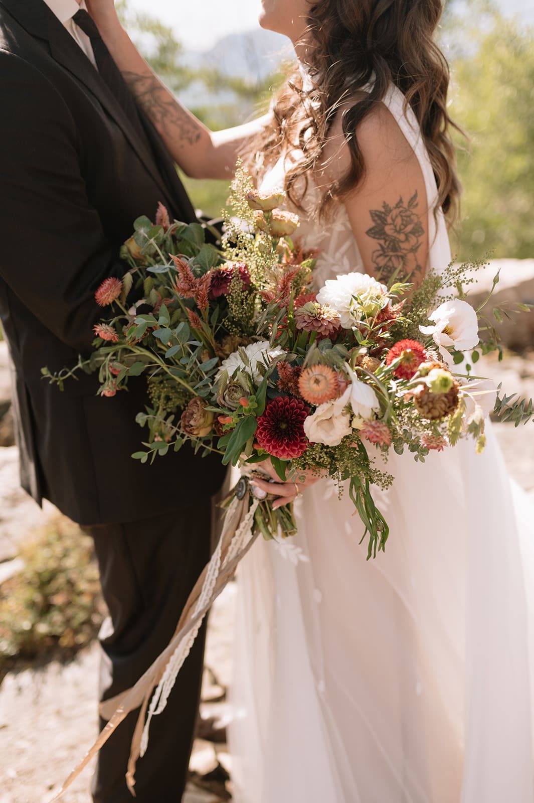 Colorful bridal bouquet with wildflower-inspired florals at a small Colorado wedding